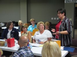 Shannon Toney of Cimarron Middle School shares her personal experiences with other teachers during character training, sponsored by the Character Council of Edmond. Photo by Jim Hulsey