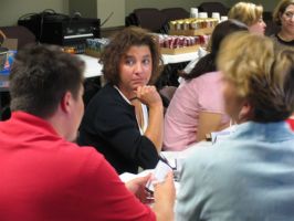 Cheyenne teacher K.C. Randolph participates with other teachers at a recent character training seminar, funding in part by two local business people. Photo by Jim Hulsey