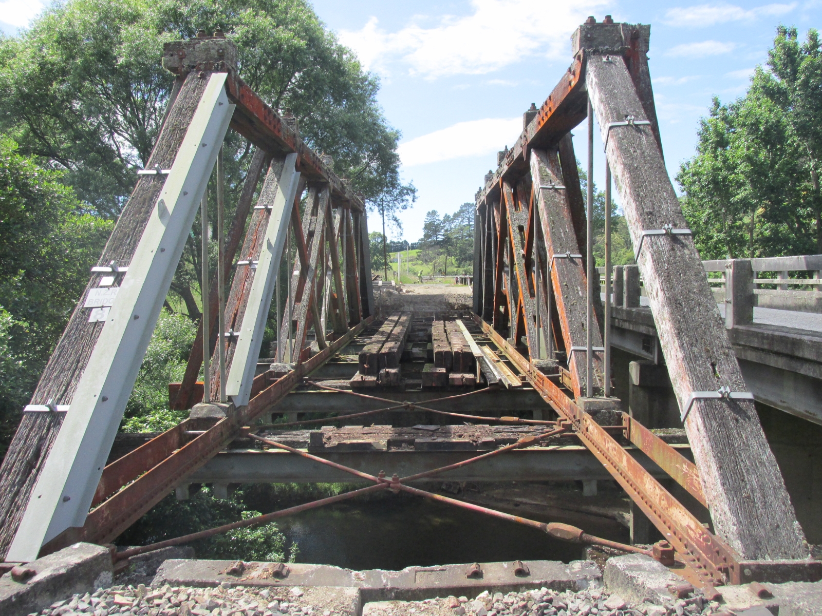 Some remaining hardwood beams to be removed before new steel bridge is inserted.