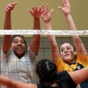 Anastasia Tamaniyaga & Diandra Morton block at the net playing with the NZ Area Schools team at Springvale Stadium, July 2015.