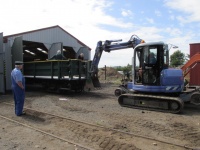 Pushing carriage back into shed
