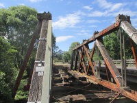 Some remaining hardwood beams to be removed before new steel bridge is inserted.