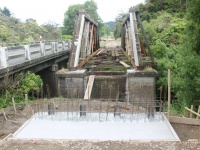 The Waitekauri Bridge had concrete poured into one of the concrete bases.